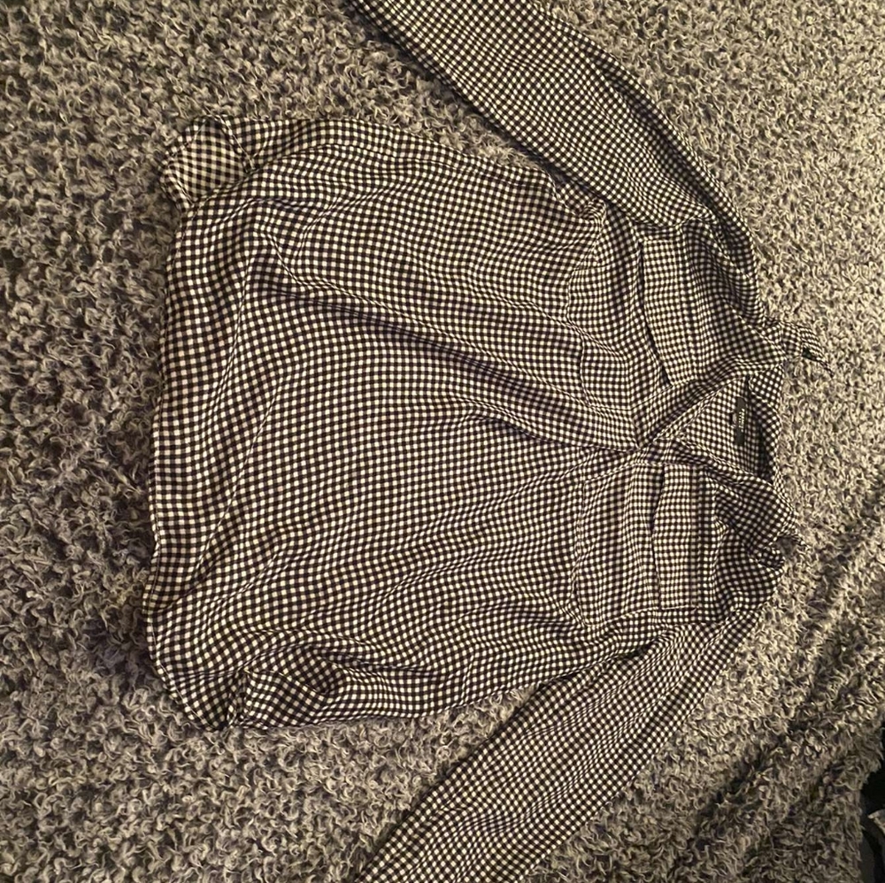 Black and white checkered blouse
